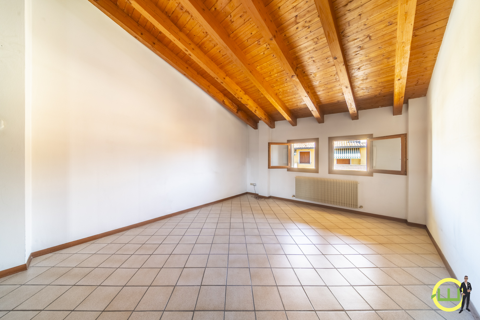 Media numero 3 di LUMINOSO ED AMPIO TRICAMERE IN PIENO CENTRO A RIVIGNANO